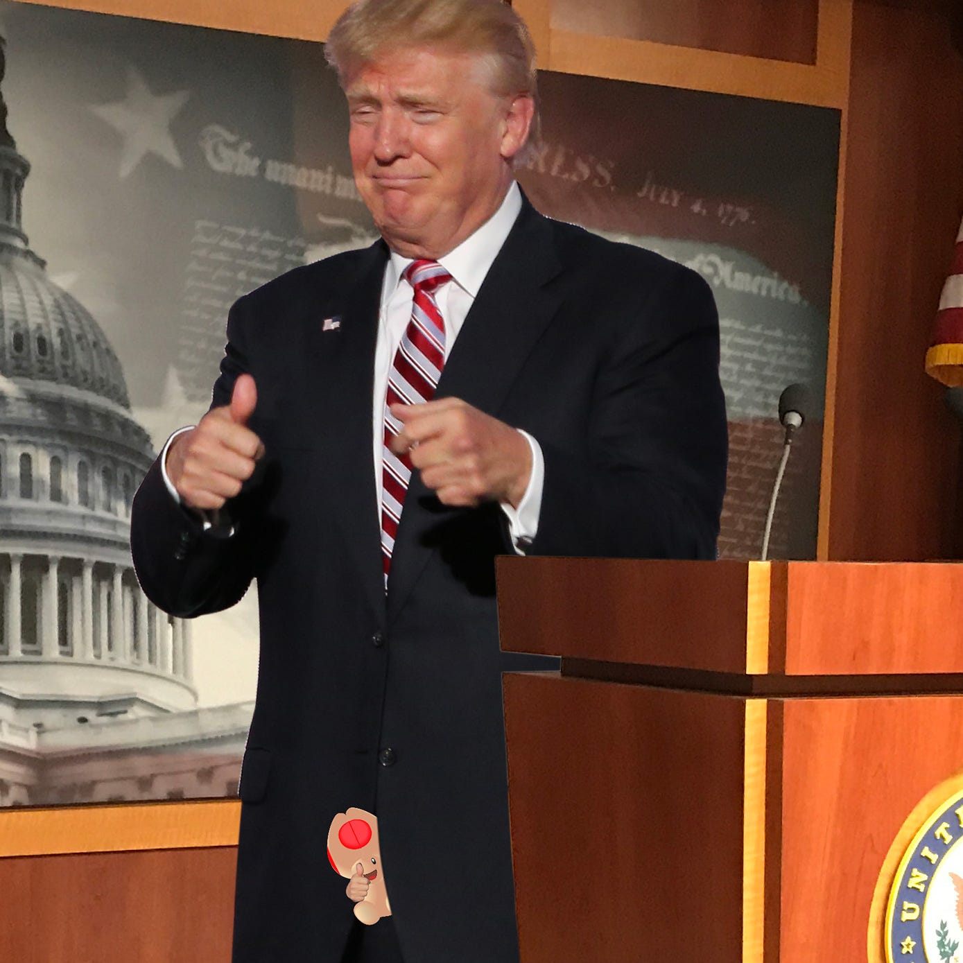 Lil' D peeks out as Drumpf congratulates himself during a speech to Senate. (Voice of America)