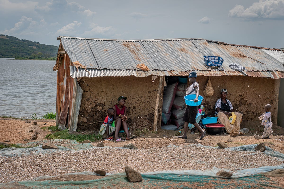 people at home near the river.