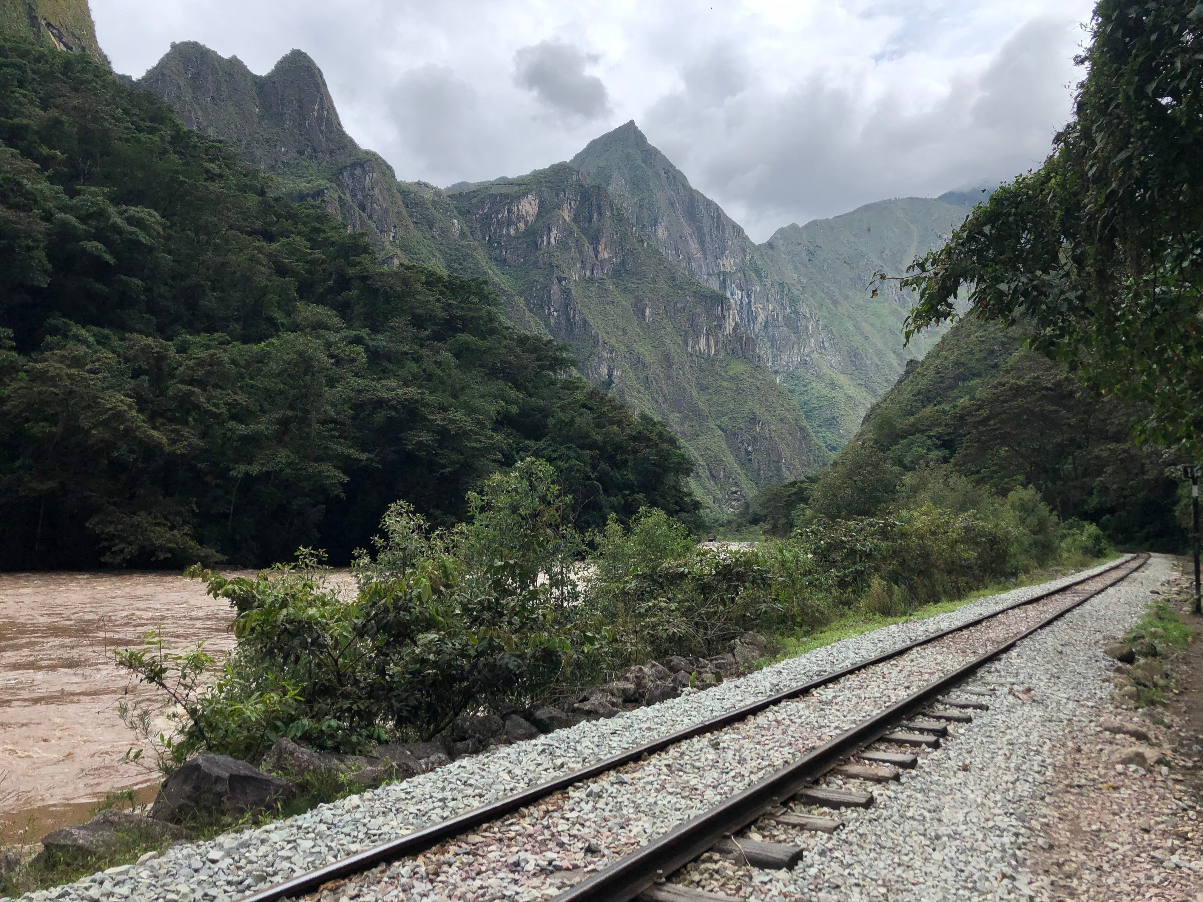 Ah! The Machu Picchu. You see some ruins at the pass between the two mountains.