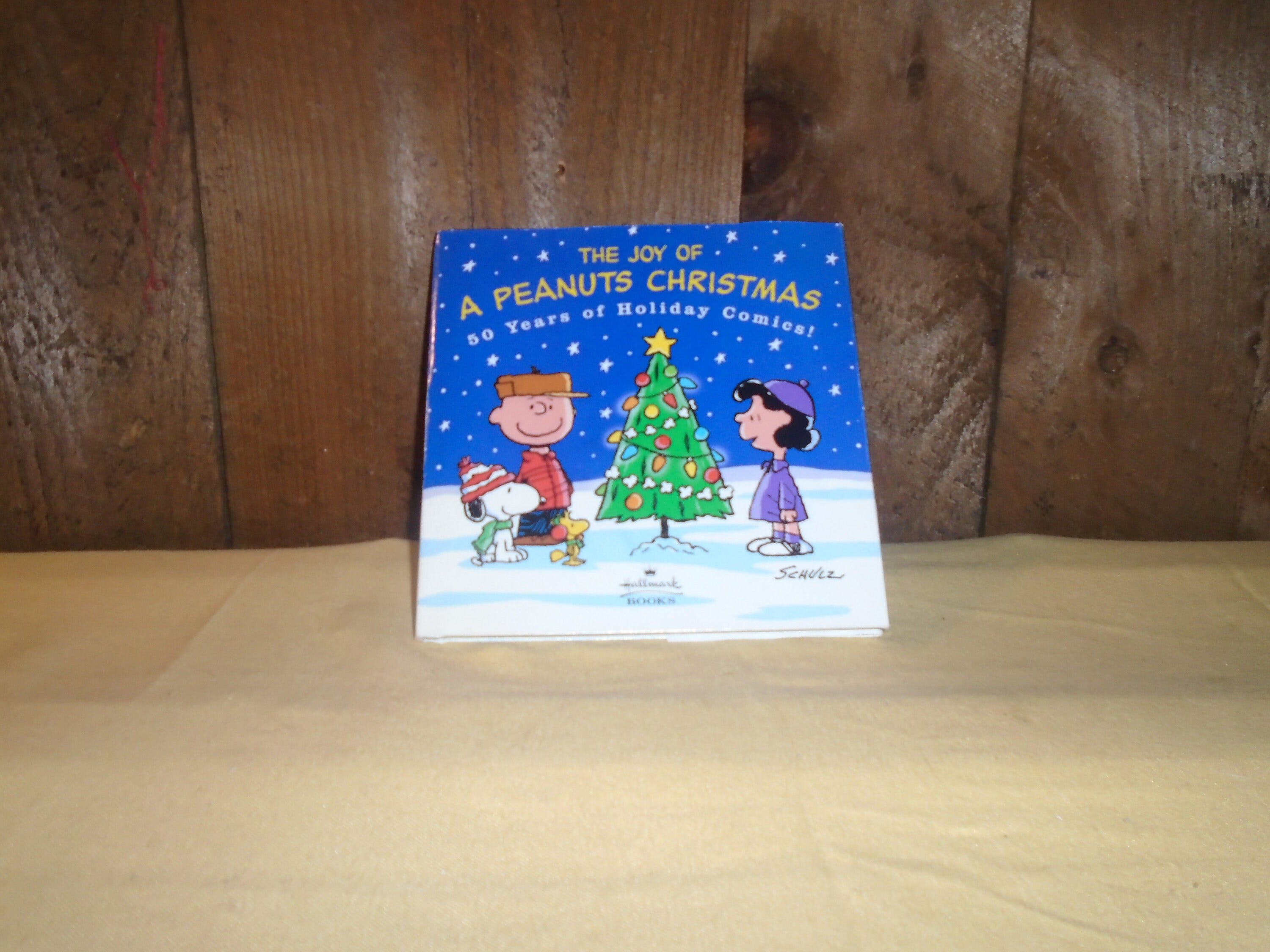The Joy Of A Peanuts Christmas 50 Years of Holiday Comics Hardcover Hallmark Book