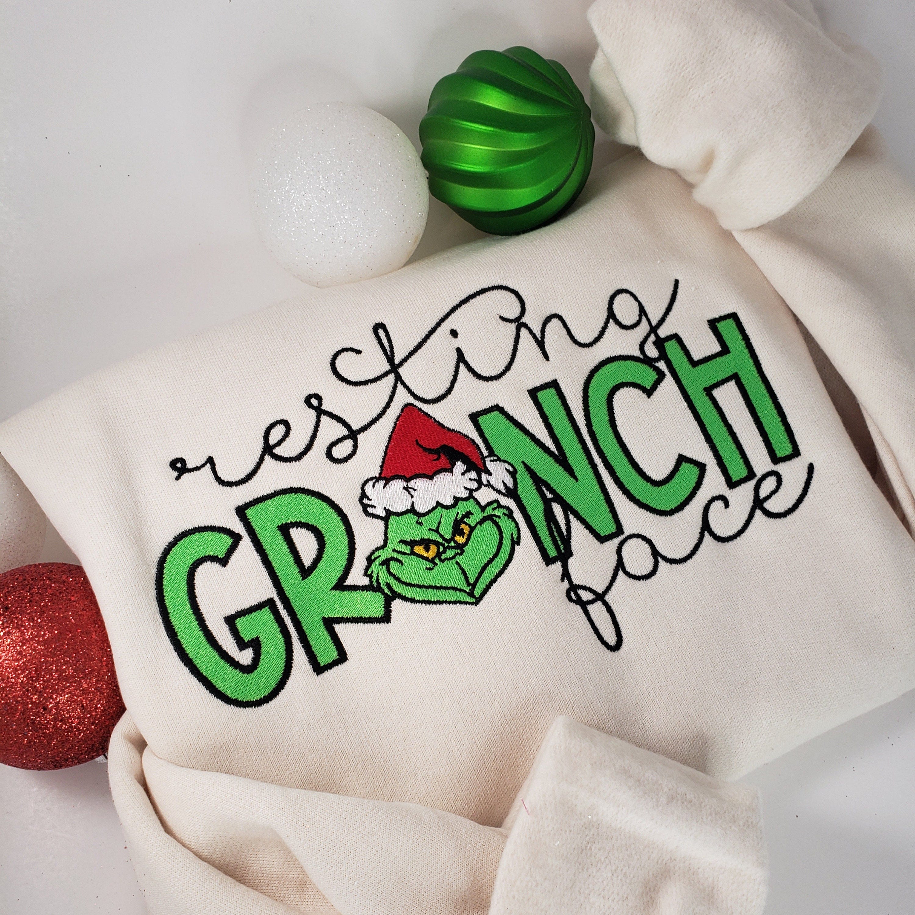 Resting Grinch Face Embroidered Unisex Sweatshirt, Trendy Christmas Shirt, Holiday Classic Movie tee