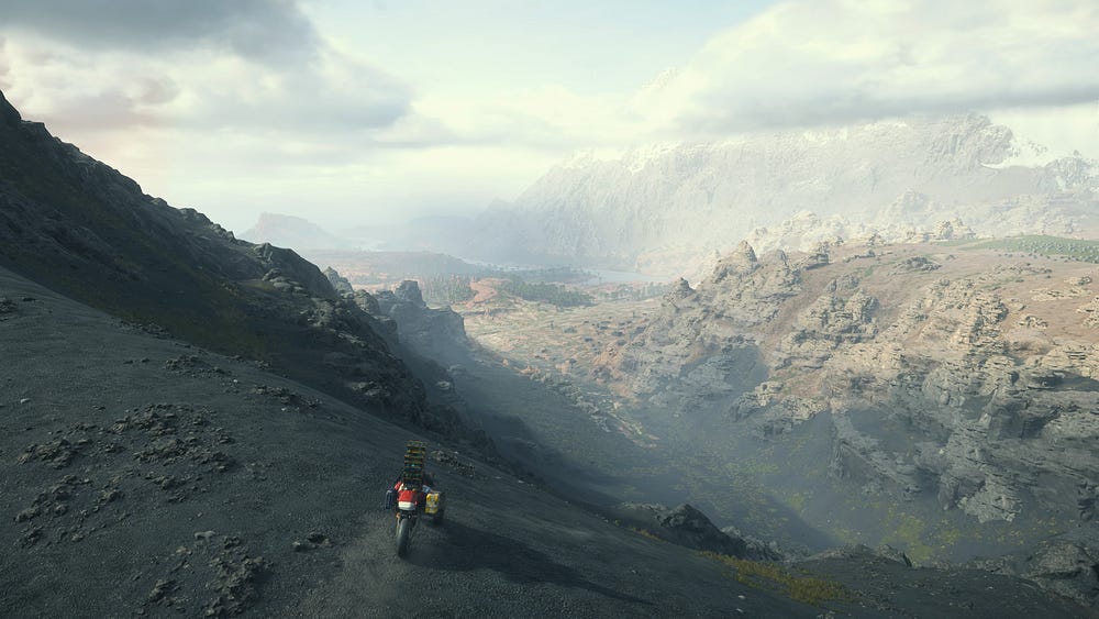 Sam riding a bike across a mountain in Death Stranding 2.